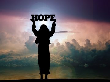 Hope Woman Silhouette Clouds Sea - geralt / Pixabay